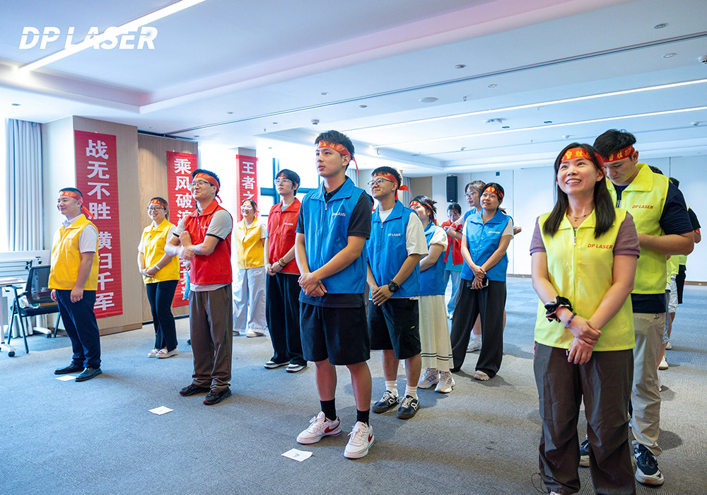 Team integrating robots for laser cutting
